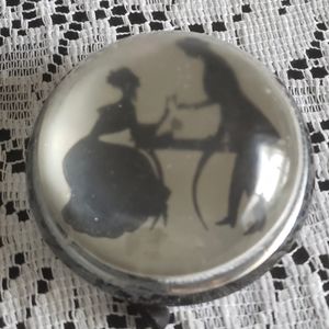 Paper Weight with Silhouette Couple Toasting.